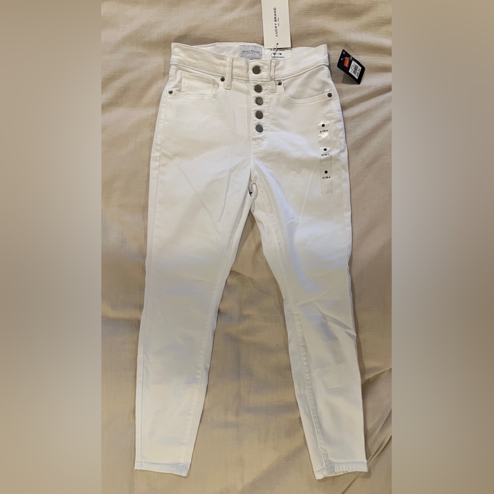 NWT Lucky Brand high waisted skinny jeans.  Button fly size 28
